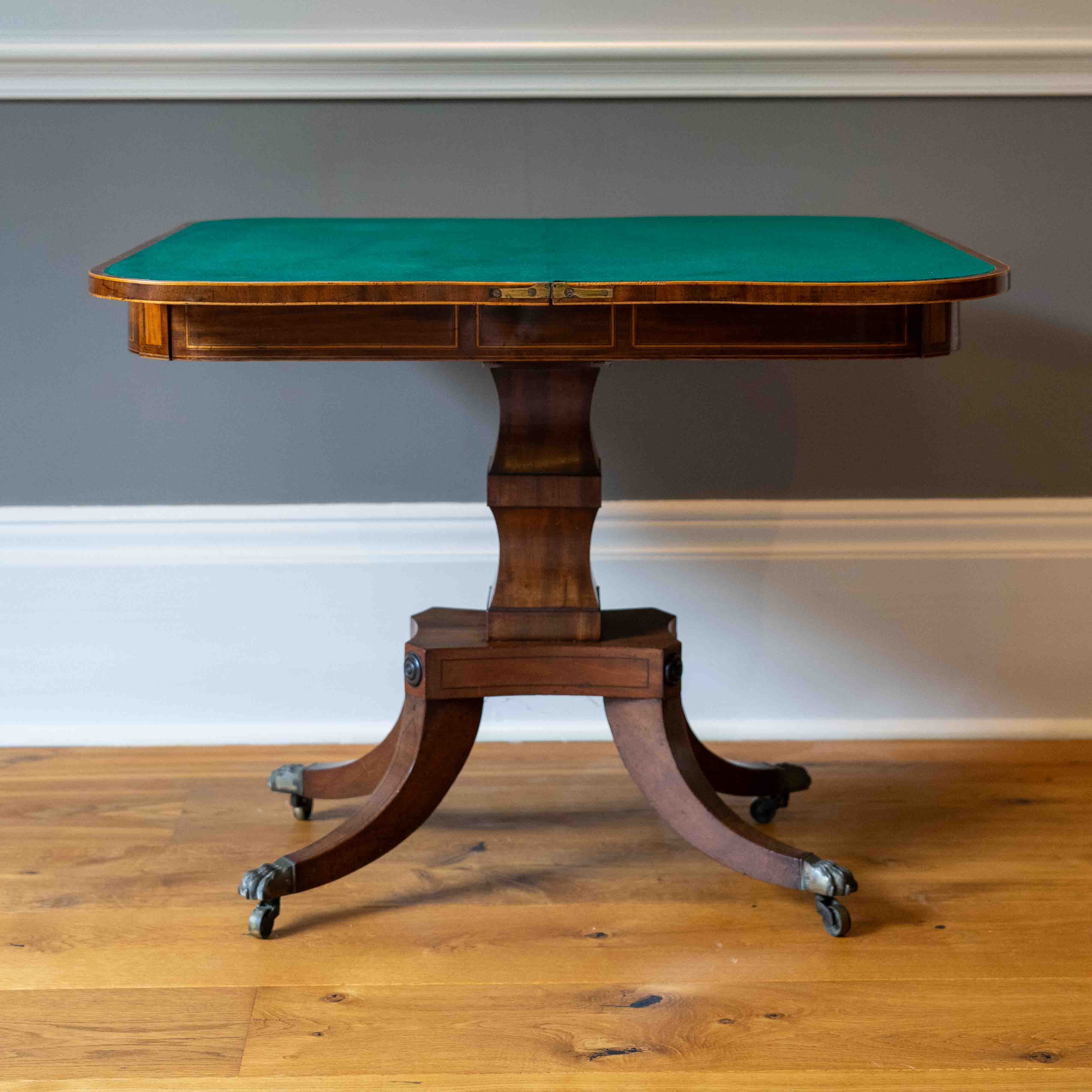 A George IV satinwood banded mahogany D shaped folding card table, width 90cm, depth 44cm, height 72cm. Condition - good